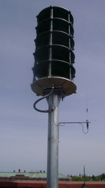 Whelen Omni Siren with radio antenna